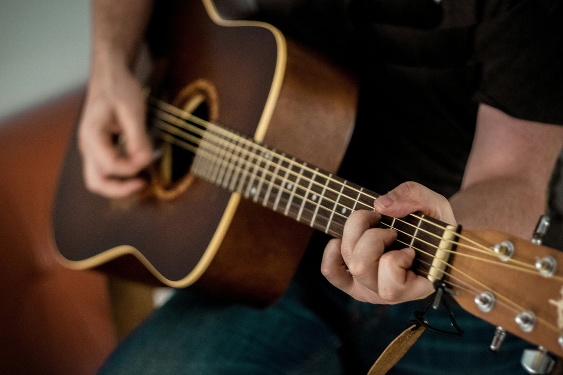 Man Playing Acoustic Guitar